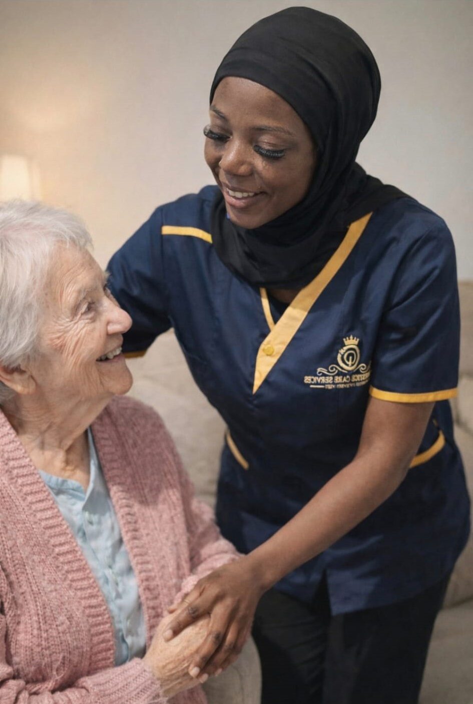 Carer assisting elderly person at home.